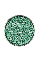 Top view of a pearly green wax bean in a container isolated in white background